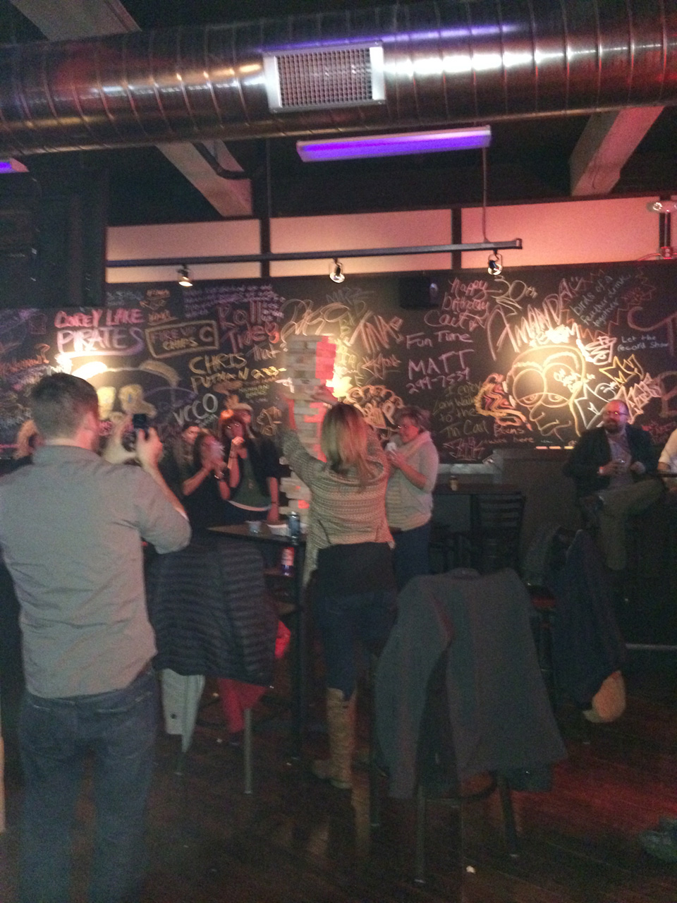 Chalkboard wall and patrons